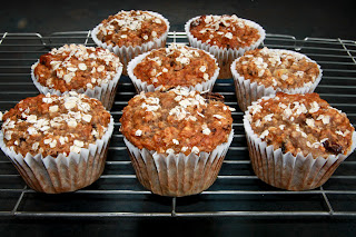 Banana, oat and raisin muffins cooling on rack