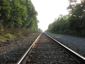 neverending train tracks, train tracks, horizon vanishing point