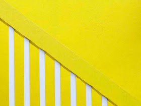 abstract, bright yellow building and staircase