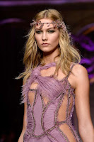 Karlie Kloss at the catwalk in Versace's Fall/Winter show during Paris Fashion Week
