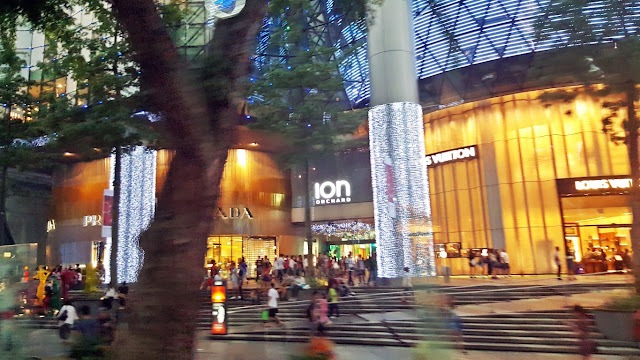 Christmas lights adorn Orchard Road in front of Ion Orchard