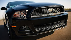 Extreme closeup of black 2013 Mustang V6 Coupe