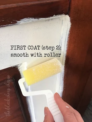 Use an open cell paint roller lightly over the brushed paint.