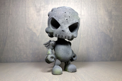 The Cement Skullhead Blank Figure by Huck Gee