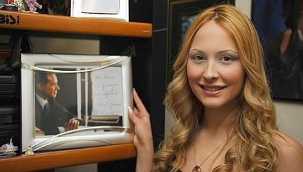 Noemi Letizia posing with Silvio Berlusiconi Biography Picture