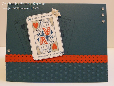 Blue card with stamped images of playing cards. The focal image is the Queen of Hearts card colored in and with the sentiment "Queen of everything." Embossed hearts along the bottom.