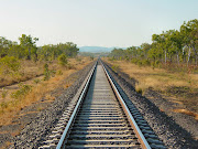 Cent per cent privatisation had been assured for laying a new railway line . (adelaide darwin railway line between adelaide river and pine creek dsc )