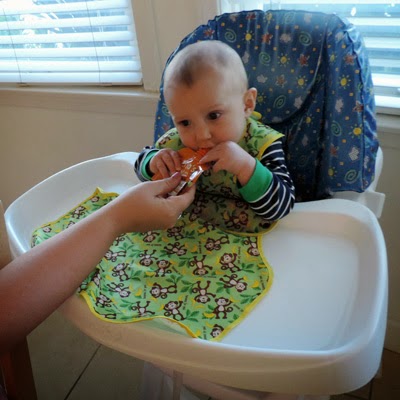 Reef Indy stays clean as he eats in his Perfect Bib by Toppy Toddler.