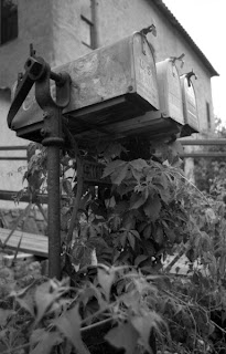 Mailboxes on Singer sewing machine treadle