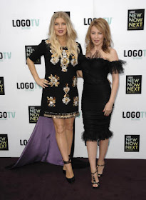 Singer Kylie Minogue, right, and singer Fergie