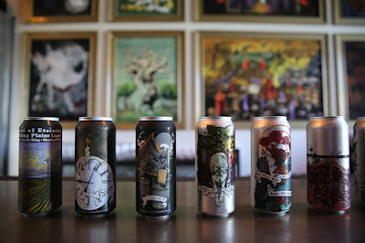 A collection of Burial Beer Co.'s latest can releases.