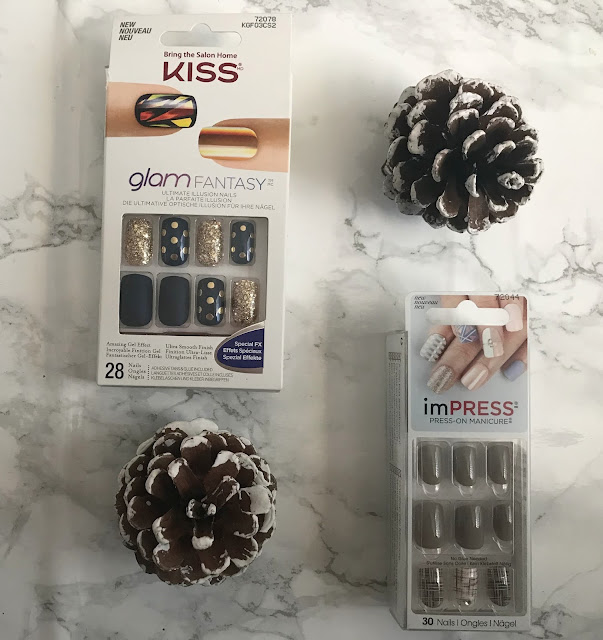 two packs of kiss stick on nails 