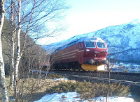 NSB Di4 diesel locomotive on passenger train