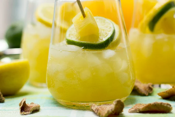 A pic of a close up of a glass of ginger pineapple