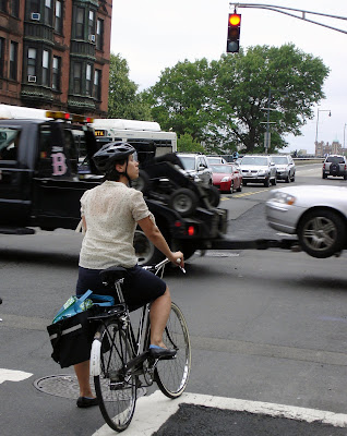 lady cycling Boston