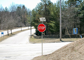 stop sign has blinking lights all around the edge