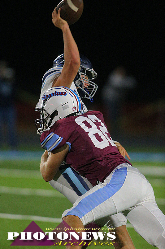 Caleb Ochs puts a lick on Prairie Central QB Avery Elder 