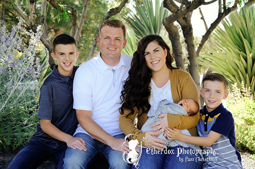 Professional portrait of a family with a newborn baby