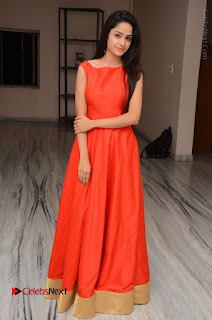 Telugu Actress Divya Nandini Stills in Orange Sleeveless Gown at Chennai Chaitrama Movie le Launch Event  0123.JPG