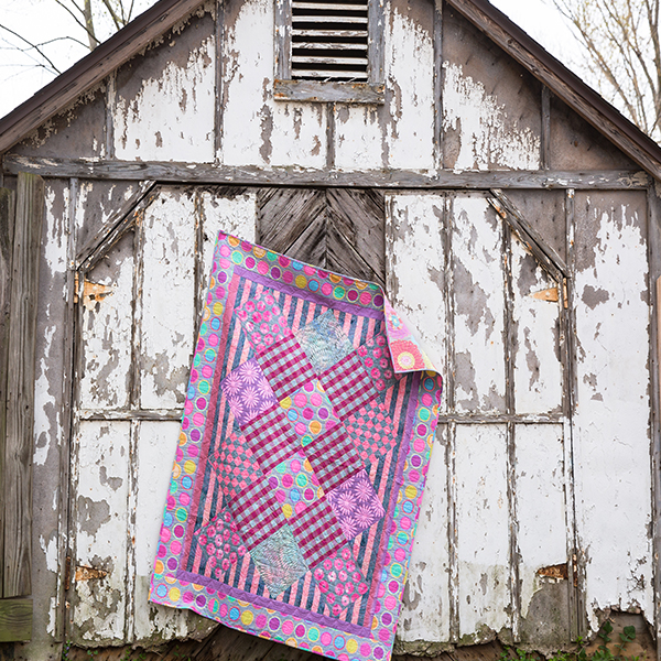 Pastel Perfection quilt pattern designed by Linda Barrett spotlighting Kaffe Fassett Artisan collection for Free Spirit Fabric