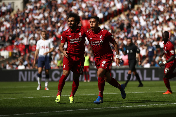 Robert Firmino is in fine form as Mohammed Salah celebrates with during Liverpool 2-1 win away at Tottenham 