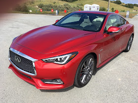 Front 3/4 view of 2017 Infiniti Q60 Red Sport 400