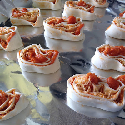 Puff Pastry Pizza Pinwheels - the sliced pinwheels ready for the oven