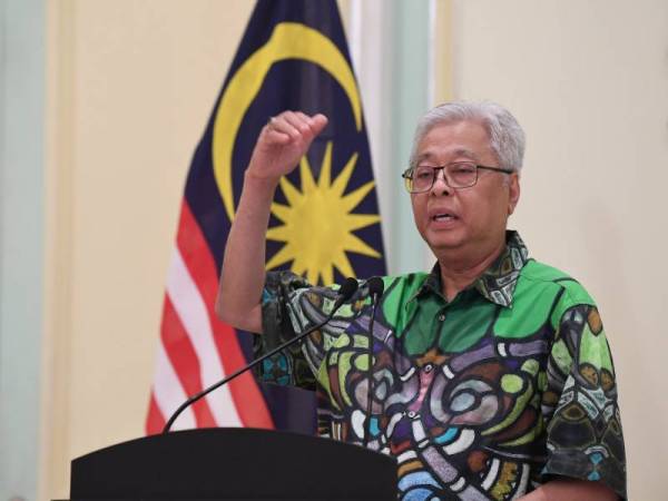 Lihat Kreatifnya Rakyat Malaysia Apabila Baju Batik Menteri Keselamatan Jadi Kuih Muih