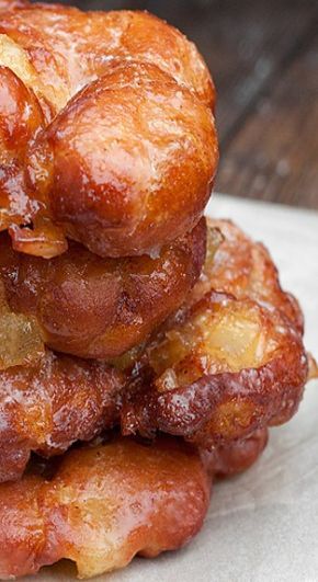 These are the real deal. They are made with a great yeast-raised dough, which is chopped together with cooked apple chunks and perfectly speckled with cinnamon. The glaze adds a thin layer of sweetness and makes these beautiful donuts sparkle.