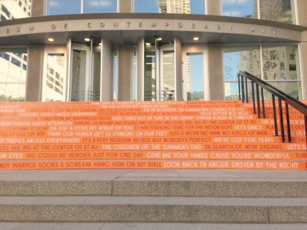 Orange steps with David Bowie song titles at MCA Chicago by Hello Lovely Studio