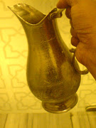 . engraved pitchers graced the toilets at the old Istanbul airport lounge. (istanbul airport mug )