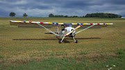 Belite Ultralight Aircraft, after precautionary landing in alfalfa field (field landing )