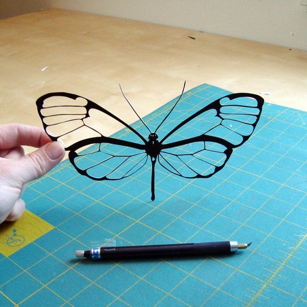 silhouette paper handcut by Joey Bagley