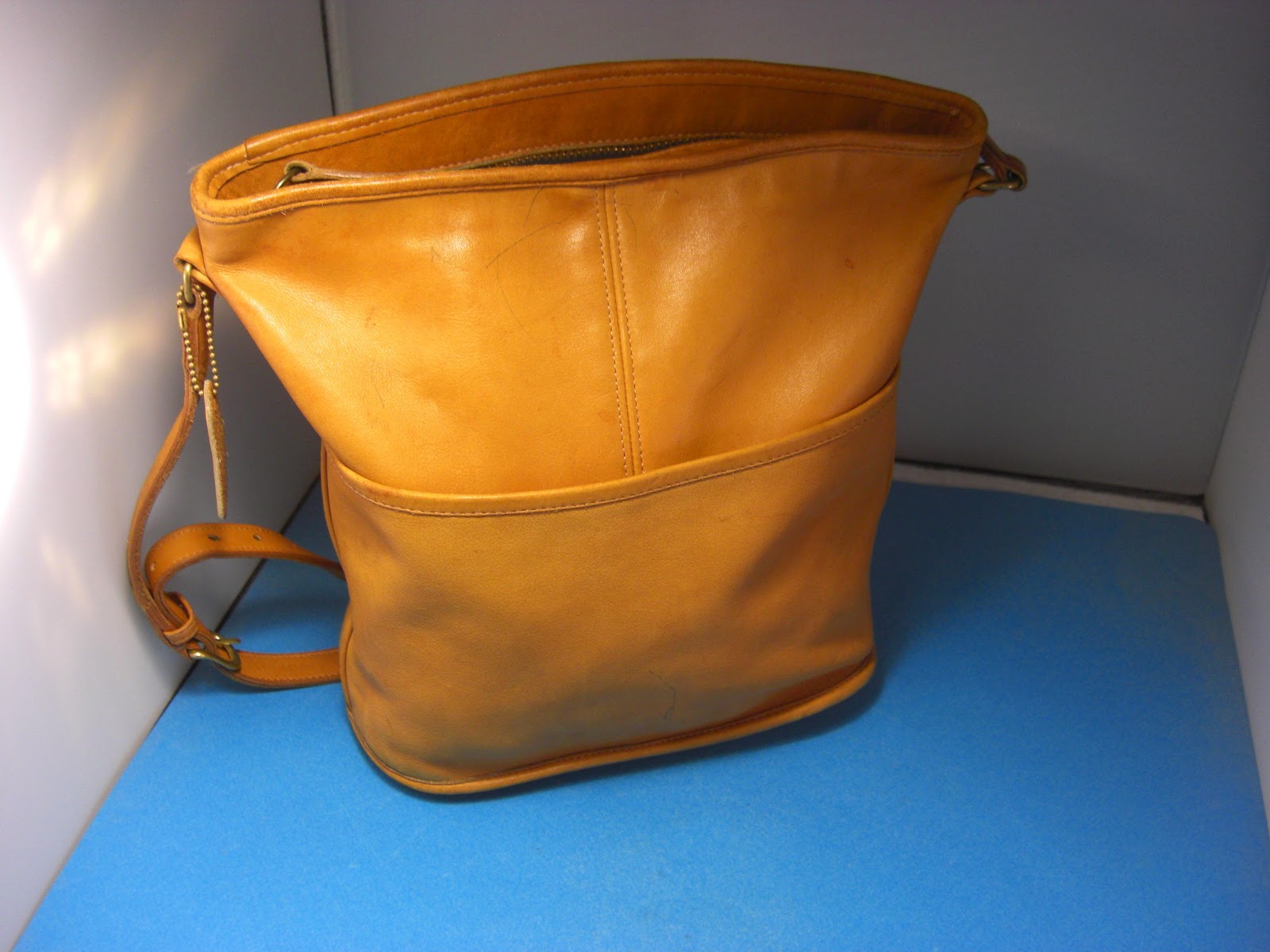 http://bargaincart.ecrater.com/p/22233074/authentic-coach-tan-leather-0245-013-crossbody