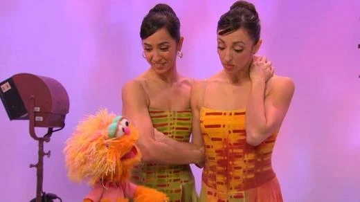 Sesame Street Episode 4508. Zoe, Lorna and Lorna Feijoo; introduces dance figures.