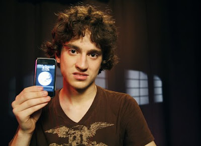 George Hotz with his unlocked iPhone