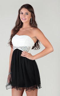 strapless dress with wired mesh skirt and chunky stone trim