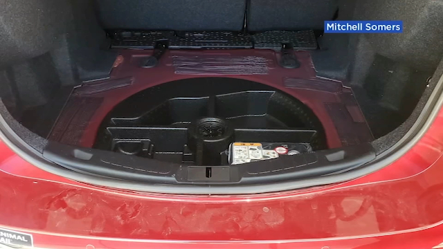 Your trunk's spare tire I'm not a big believer of putting gifts in the open section of the trunk—mostly because I drive an SUV with a rear seat that allows you to look into the trunk, making it a lousy hiding site. Even if my trunk was enclosed, I'd be concerned that I'd forget about the gifts one day and open the trunk in front of my child. But what about the spare tire well? Nobody's going to peek in there, especially if there are a bunch of other miscellaneous items—reusable bags, blankets, jumper cables, and the like—clogging up the area.