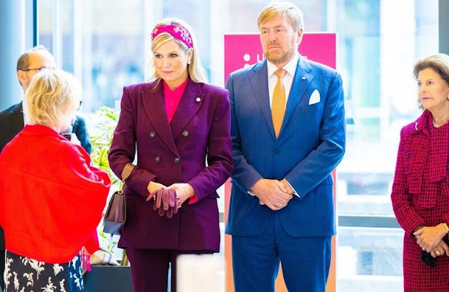 Queen Maxima wore a burgundy aubergine suit blazer by Zara. H&M pink headpiece. Queen Silvia wore a tweed dress set by Chanel