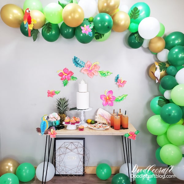 How to Throw a Luau Tropical Party!  I love a great tropical vibe--and a luau party is the perfect way to celebrate!   Let me show you some simple ways to set up a tropical luau party!   Watercolor some hibiscus flowers, make tropical cupcakes and cookies, decorate with pineapple, shells and balloons.
