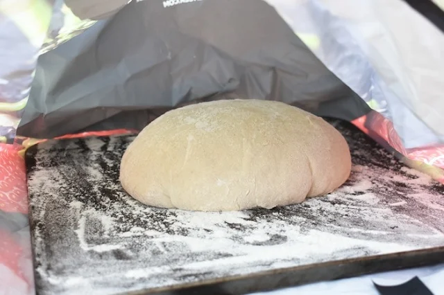 Second rising of dough in bag sprayed with water