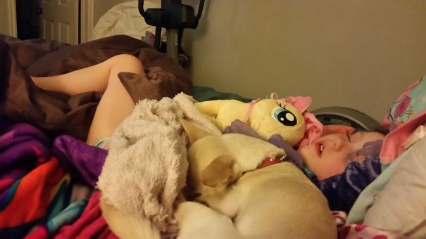 15+ Hilarious Pics That Prove Kids Can Sleep Anywhere - Napping With The Dog