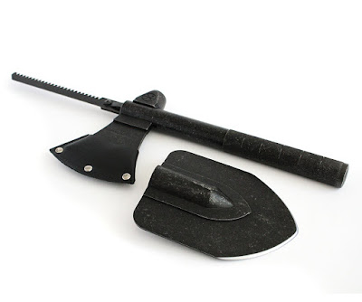 Adventure Mate Lets You Carry A Hatchet, A Shovel, A Saw, A Hammer And Peg or Pot Hook When Traveling In The Wild