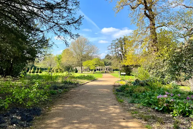 A wide path and part of the formal pleasure gardens of Hylands House