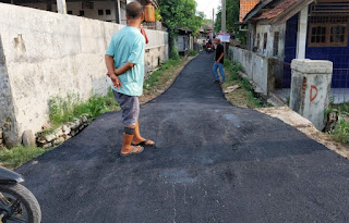 Penuhi Keinginan Warga, Pemdes Muncung Manfaatkan Dana Desa Muluskan Jalan Lingkungan