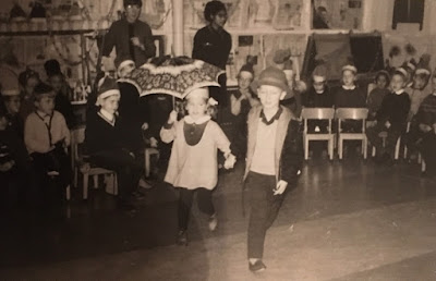 black and white photo of Corina Duyn and Frans Hogevorst dancing in a school party, aged 4. Movement is life