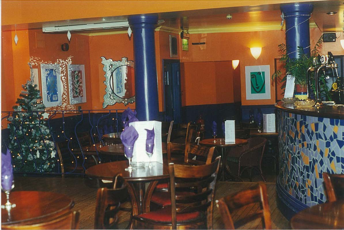 Interior of Central bar Jazz Club with one of my silver sunburst mirror designs in background