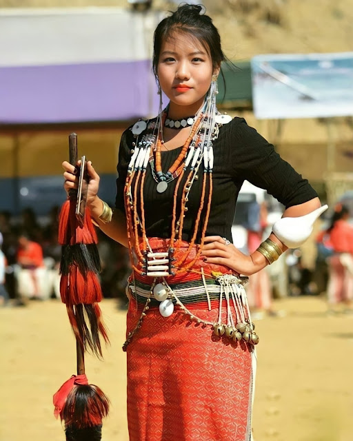 A Nocte lady wearing traditional attires and dresses