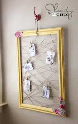 Photos on criss-cross twine in frame