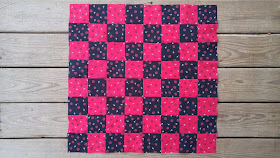 Red and black checkerboard checkers quilt